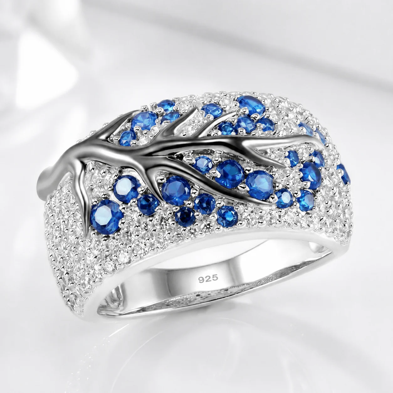 SILVER BLUE TOPAZ LEAF RING